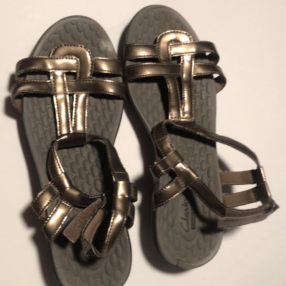 Woman’s spring silver Clarks collection gray sandals